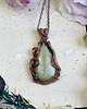 wisiory Miedziany wisiorek wire wrapping z serafinitem aqua