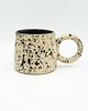 kubki Ceramiczny kubek z okrągłym uszkiem
