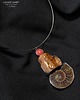 wisiory Bursztyn i skamielina amonit z Madagaskaru niezwykły wisior handmade prezent
