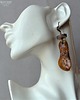 kolczyki wire wrapping Autorskie designerskie zakręcone niezwykłe kolczyki handmade bursztyn