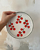 patery i talerze Talerz porcelanowy w pomidorki z zielonym rantem / 21 cm
