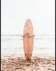plakaty Plakat "Deska surfingowa na plaży"