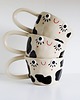 kubki Ceramiczny kubek w krowie łaty