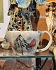 filiżanki Kubek ceramiczny z leśnym motywem.