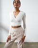 topy damskie Top do jogi TOTAL ECLIPSE Wrap Top - coconut white xs/s