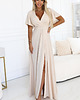 sukienki maxi damskie 581-6 JENNIFER długa suknia z rozcięciem na nogę i dekoltem - beżowa