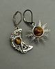 kolczyki wire wrapping Asymetryczne kolczyki księżyc i słońce tygrysie oko wire wrapping