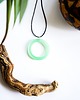 wisiory Zielony okrągły wisiorek świecący w ciemności i UV handmade 2,9 cm