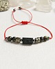 bransoletki z kamieni naturalnych OCHRONNA bransoletka - turmalin, piryt, obsydian. Czerwony sznurek.