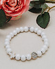 bransoletki drewniane Perłowo biała bransoletka z krzyżykiem  różaniec na rękę  RĘKODZIEŁO