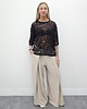spodnie materiałowe damskie Tkaninowe spodnie boucle z zakładkami - Beige