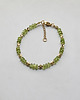 bransoletki z kamieni naturalnych Delikatna zielona bransoletka z oliwinu