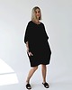 sukienki midi damskie Oversizowa czarna sukenka z jerseyu