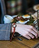 bransoletki drewniane Bransoletka pleciona - koło z serduszkami