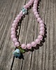 chokery Różowy naszyjnik choker z koralików z kwiatem