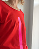 t-shirt damskie Kreska różowa na czerwonym Oversize