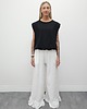 spodnie materiałowe damskie Tkaninowe spodnie boucle z falbankami - cream