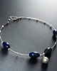srebrne naszyjniki Elegancki srebrny naszyjnik z perłą i lapis lazuli. [PN1]