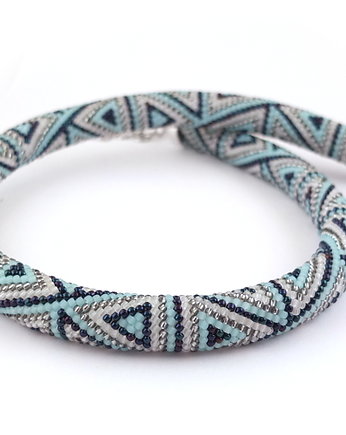 triblu, maghia