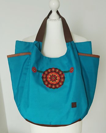 Mandala haftowana, berta
