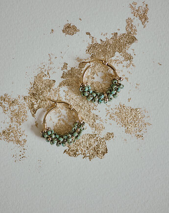 Kolczyki koła z Atlantydy, Okruszek Biżuteria