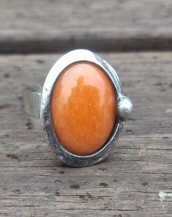 Pomarańczowy - pierścionek regulowany, po drugiej stronie lustra