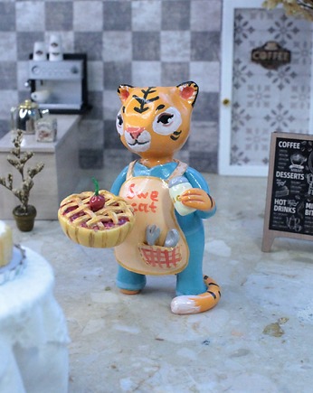 Tygrys Piekarz, Qletta Clay