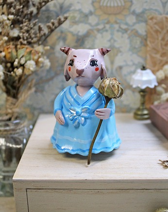 Kózka z kwiatuszkiem, Qletta Clay