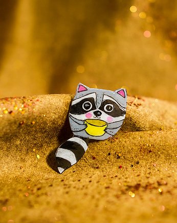 Broszka z szopem Lucjanem, Pintura