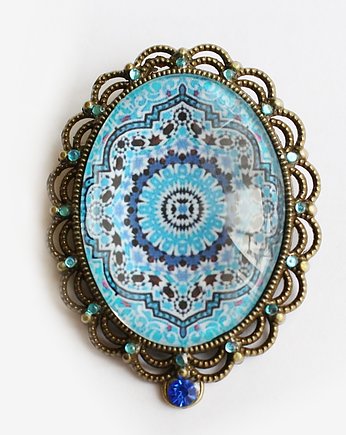 Marokanka broszka, KEIT