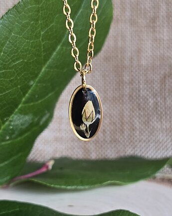 Złota jajowata zawieszka z kwiatami, zkwiatem