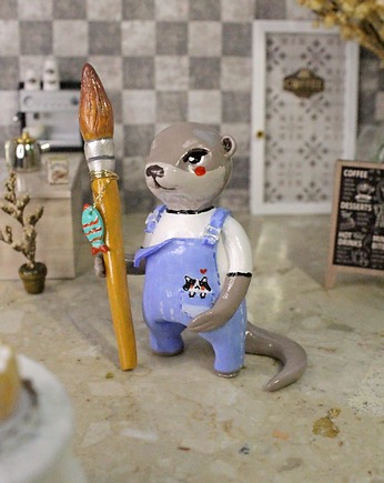 Wydra artysta z pędzelkiem, Qletta Clay