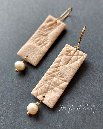 Kolczyki ivory no2, Motywator Eweliny