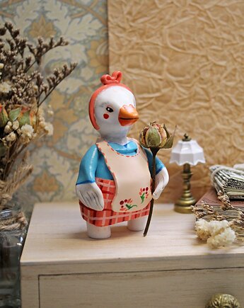 Kaczka z fartuchem, Qletta Clay