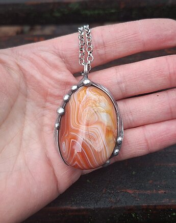 Żywe kultury bakterii - wisiorek, po drugiej stronie lustra