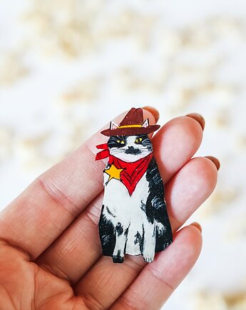 Broszka kot szeryf, Pintura