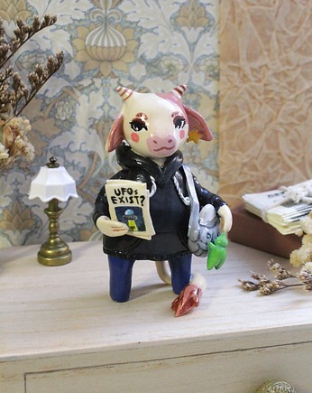 Krowa Fanka UFO, Qletta Clay