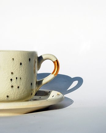 Kubek Dalmatyńczyk z talerzykiem porcelit/złoto, Ceramiczności