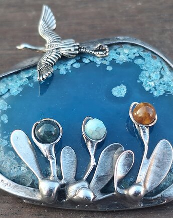 Odlatujący - broszka, po drugiej stronie lustra