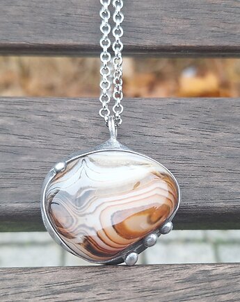 Żywe kultury bakterii - wisiorek, po drugiej stronie lustra