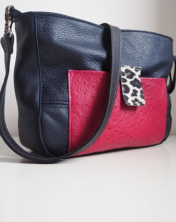 Granatowa listonoszka, Łagoda