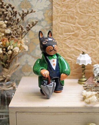 Doberman dżentelmen, Qletta Clay