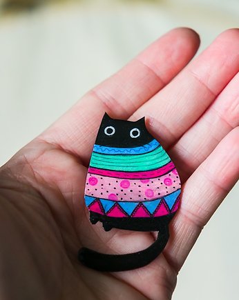 Czarny kot w swetrze, Pintura
