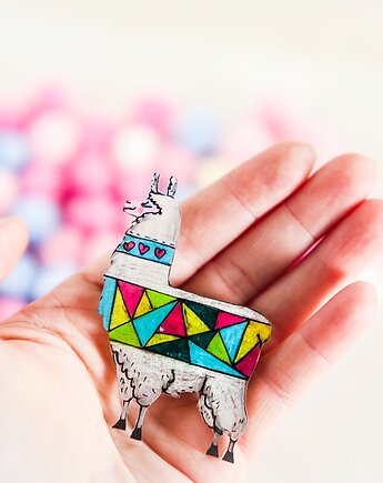 Urocza broszka z Lameuszem, Pintura