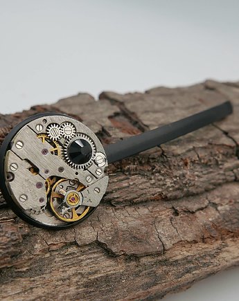 Mechaniczna wsuwka 136, Zegarynki