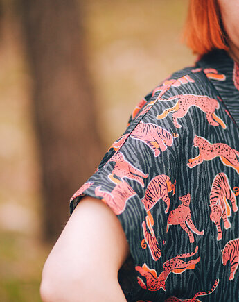 Koszula tygrys, Że co