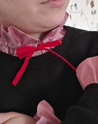 Kołnierzyk z mankietami, Rzecz w Tym