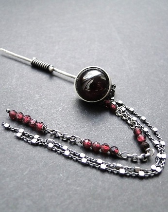 Broszka z granatami, Memero