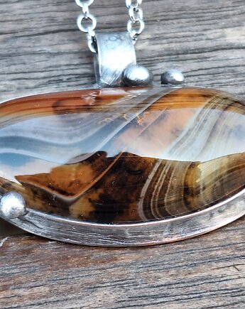 Żywe kultury bakterii - wisiorek, po drugiej stronie lustra