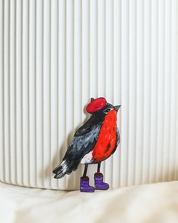 Przypinka z gilem Januszem, Pintura